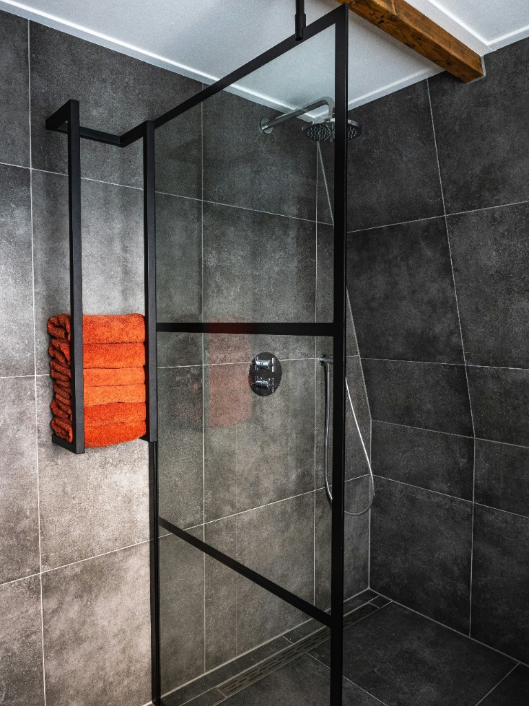 Custom porcelain tile shower and tile floor installation